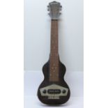 A 1939 Kalamazoo (made under license by Gibson) Lapsteel guitar, with a valve operated amp and