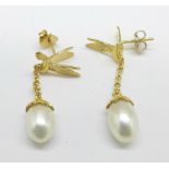 A pair of silver gilt, freshwater pearl and bird pendant earrings