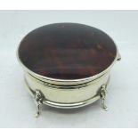 A silver and faux tortoiseshell trinket box, 76mm