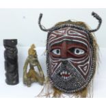 Two Polynesian carvings and a tribal mask