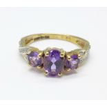 A 9ct gold, amethyst and diamond ring, 2.4g, M