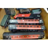Five model railway wagons and a Hornby 'Virgin' railway engine with three carriages