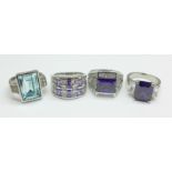 Four large stone set dress rings, three size P/Q, one T