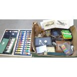 Two pairs of binoculars, a Cyprus cigarette case, paints, a collection of Valentine's WWII