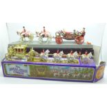 A Corgi Royal State Landau and Crescent Royal State Coach, both boxed