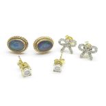 Three pairs of 9ct gold earrings, one set with opal, a/f, two set with diamonds, total weight 3.7g