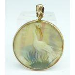 A 9ct gold and mother of pearl pendant, loop a/f, 39mm