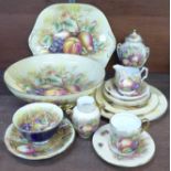 A collection of Aynsley Orchard Gold china including a large bowl, lidded vase, sandwich plate,