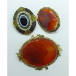 Two gilt metal and agate slice brooches and a 19th Century brooch