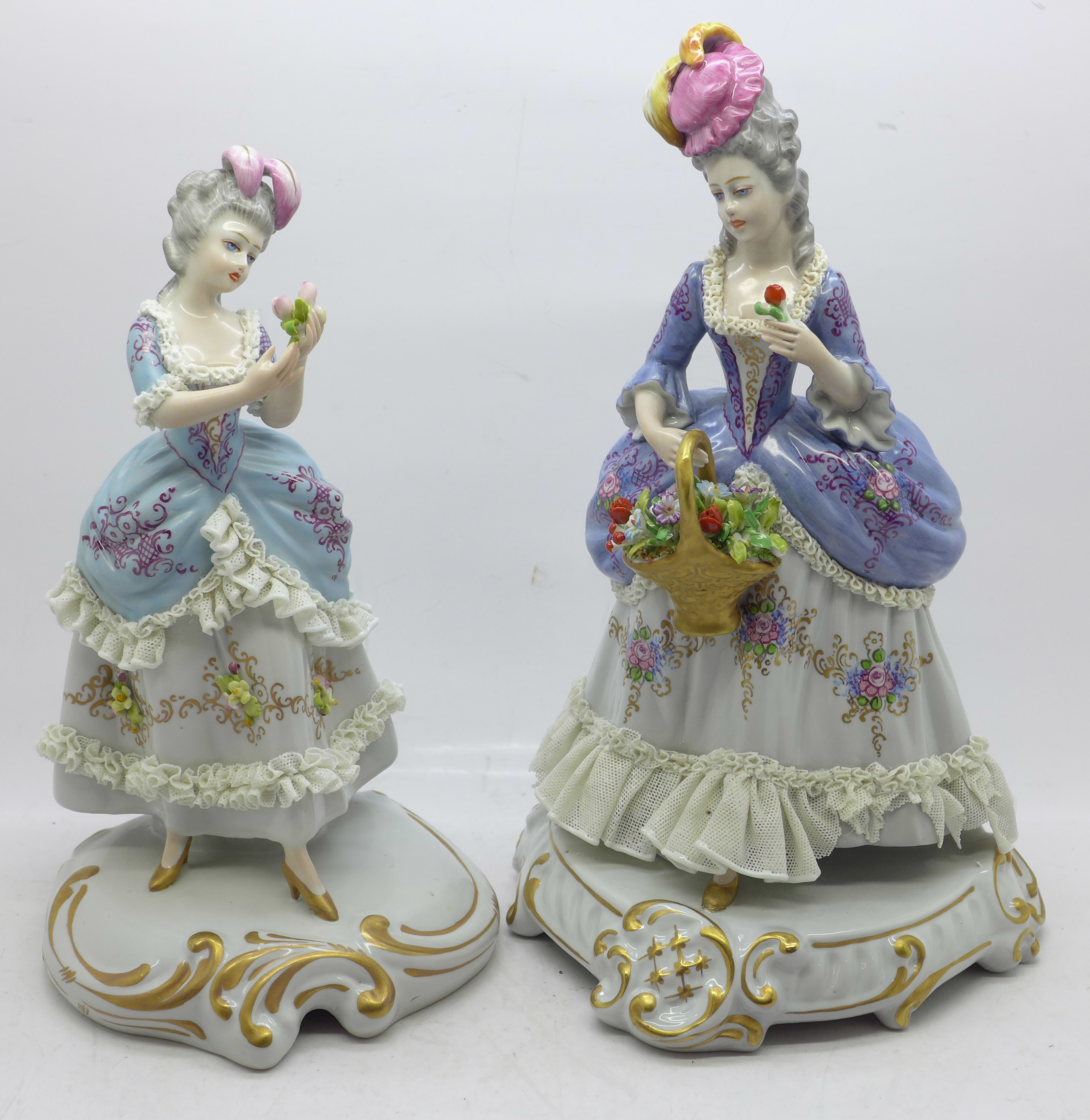 Two Capodimonte Neapolitan figures, some lace detailing a/f