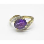 A 9ct gold, amethyst and diamond ring, 2.5g, M