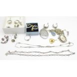 Silver jewellery including a locket