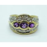 A 9ct gold, diamond and amethyst ring, 0.25carat diamond weight, 4.5g, L