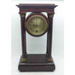 A portico mantel clock