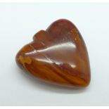 An amber heart shaped pendant