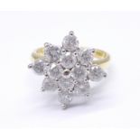 An 18ct gold and diamond cluster ring, 2.0carat diamond weight, marked on the shank, 5.9g, N