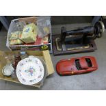 A Ferrari model racing car and two boxes of mixed china, glass, wristwatches, and sewing machine,