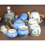 A three piece fox hunting tea service, a Dartmouth Pottery tea for two teaset, a Poole Pottery