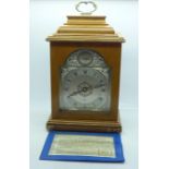 An Elliott oak mantel clock, Queen's 25th Anniversary Timepiece, 121/500 with certificate