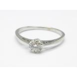 A 9ct white gold and diamond solitaire ring, over 0.25carat diamond weight, 1.8g, R