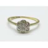 An 18ct gold and diamond cluster ring, 2g, N