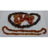 Two amber necklaces and loose amber beads
