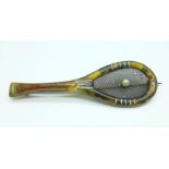 A novelty Edwardian tortoiseshell and pearl tennis racquet brooch, a/f