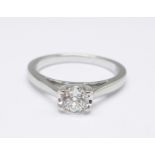 An 18ct white gold solitaire diamond ring, 0.41carat weight marked on the shank, the inner shank