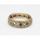 A 9ct gold eternity ring, lacking one stone, 3.3g, O