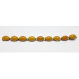 An amber bracelet, fastener a/f