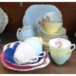 A Coalport tea set, seven setting with three sandwich plates, cream and sugar and one other cup,