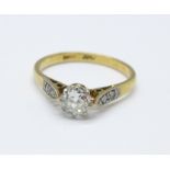 An 18ct gold, platinum set diamond solitaire ring, 2g, L