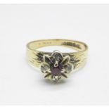 A 9ct gold, garnet and diamond ring, 2.2g, K