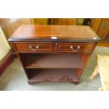 An inlaid mahogany open bookcase