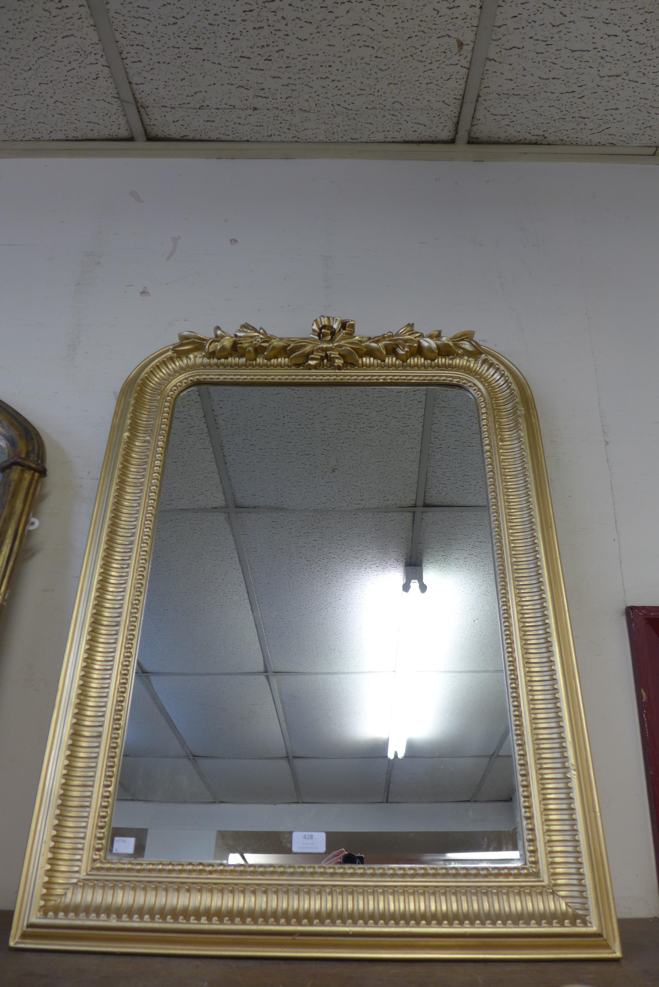 A Victorian style gilt framed mirror