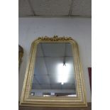 A Victorian style gilt framed mirror