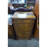 A mahogany bow front chest of drawers