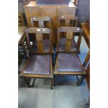 A set of four oak dining chairs