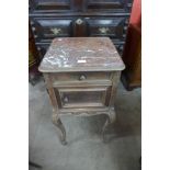 A 19th Century French rosewood and marble topped table de nuit