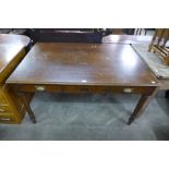 An early 20th Century mahogany writing table (lacking drawers to one side)