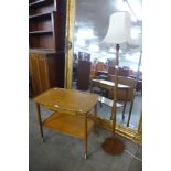 A Danish teak trolley and a teak standard lamp