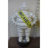 A cast iron Michelin advertising figure