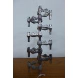 A mid 20th Century chrome modular candlestick by Fritz Nagel