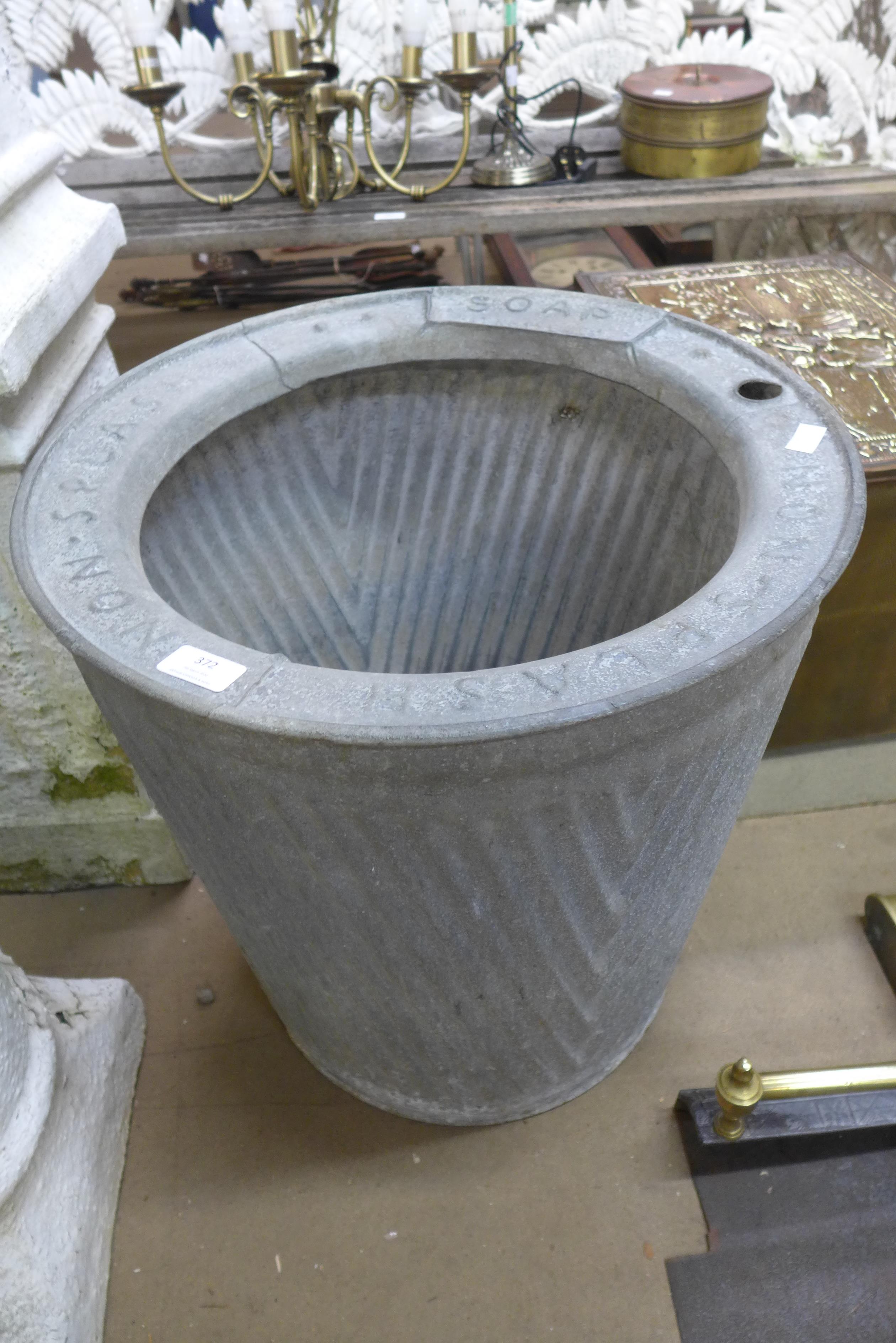 A galvanised dolly tub