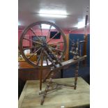 A fruitwood spinning wheel