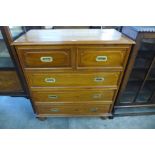 A campaign style mahogany chest of drawers