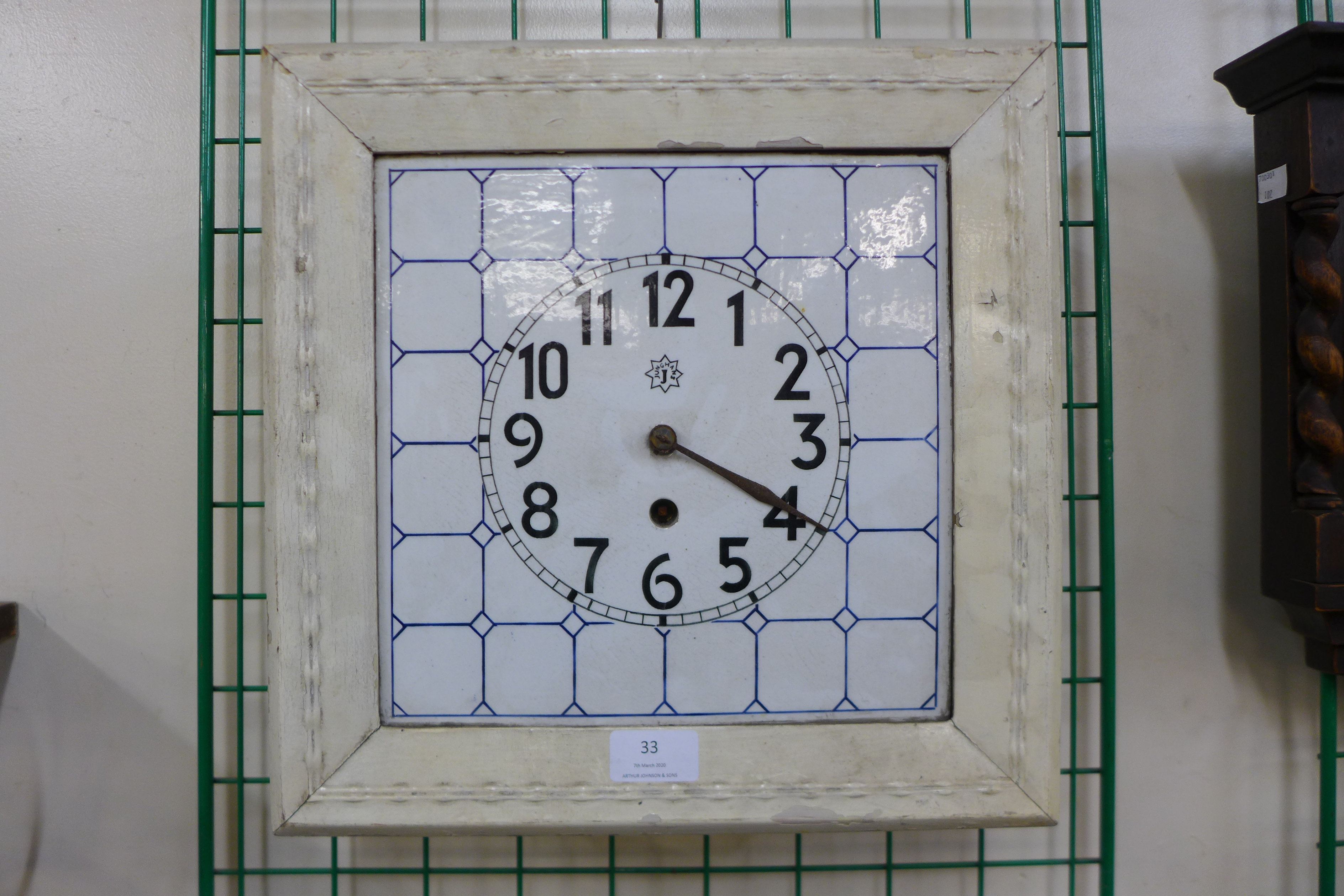 A Junghans Secessionist porcelain faced wall clock