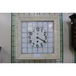 A Junghans Secessionist porcelain faced wall clock