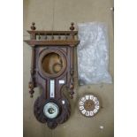 A 19th Century French carved beech wall clock and barometer