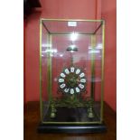 A gilt metal fusee skeleton clock